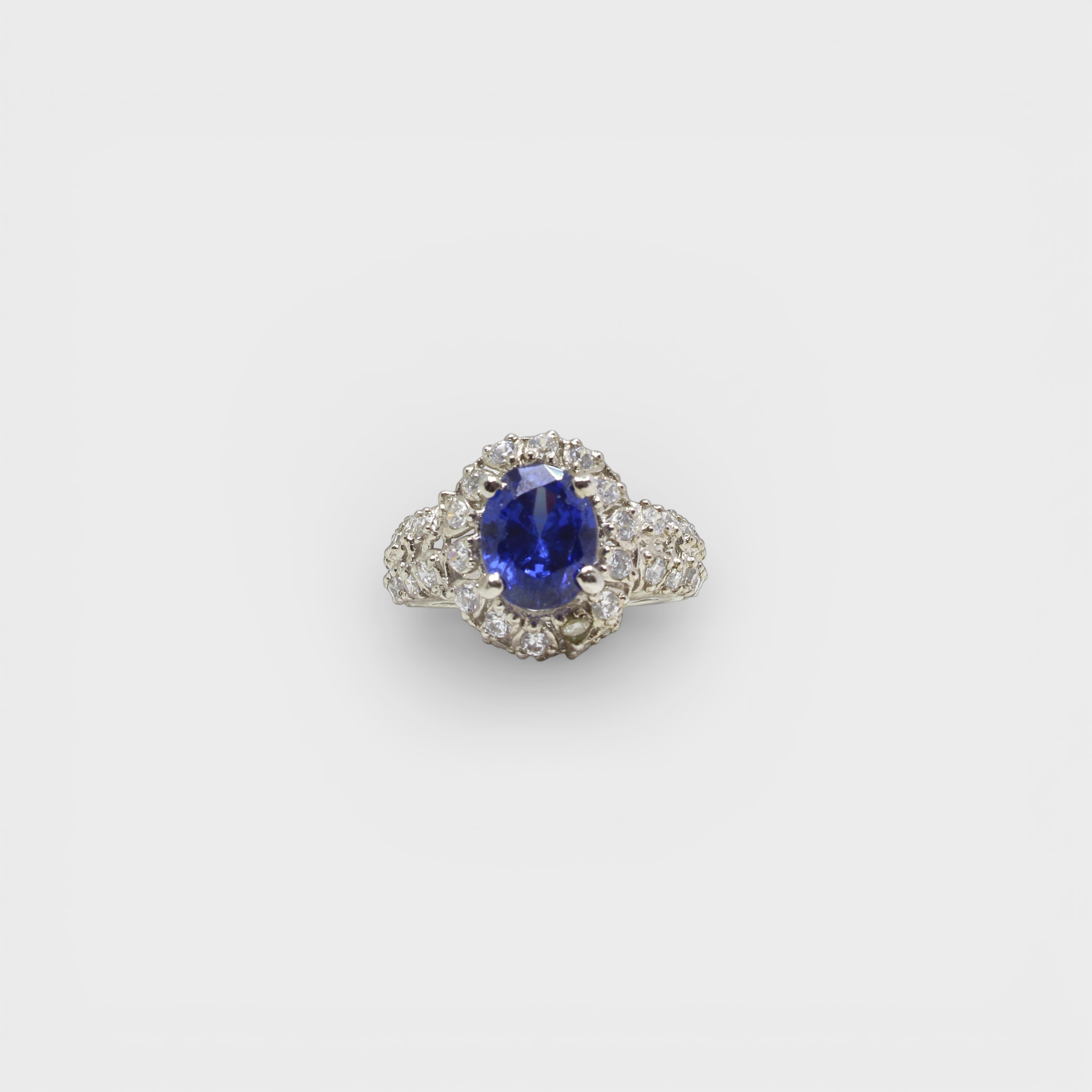 Sapphire Starburst Halo Ring