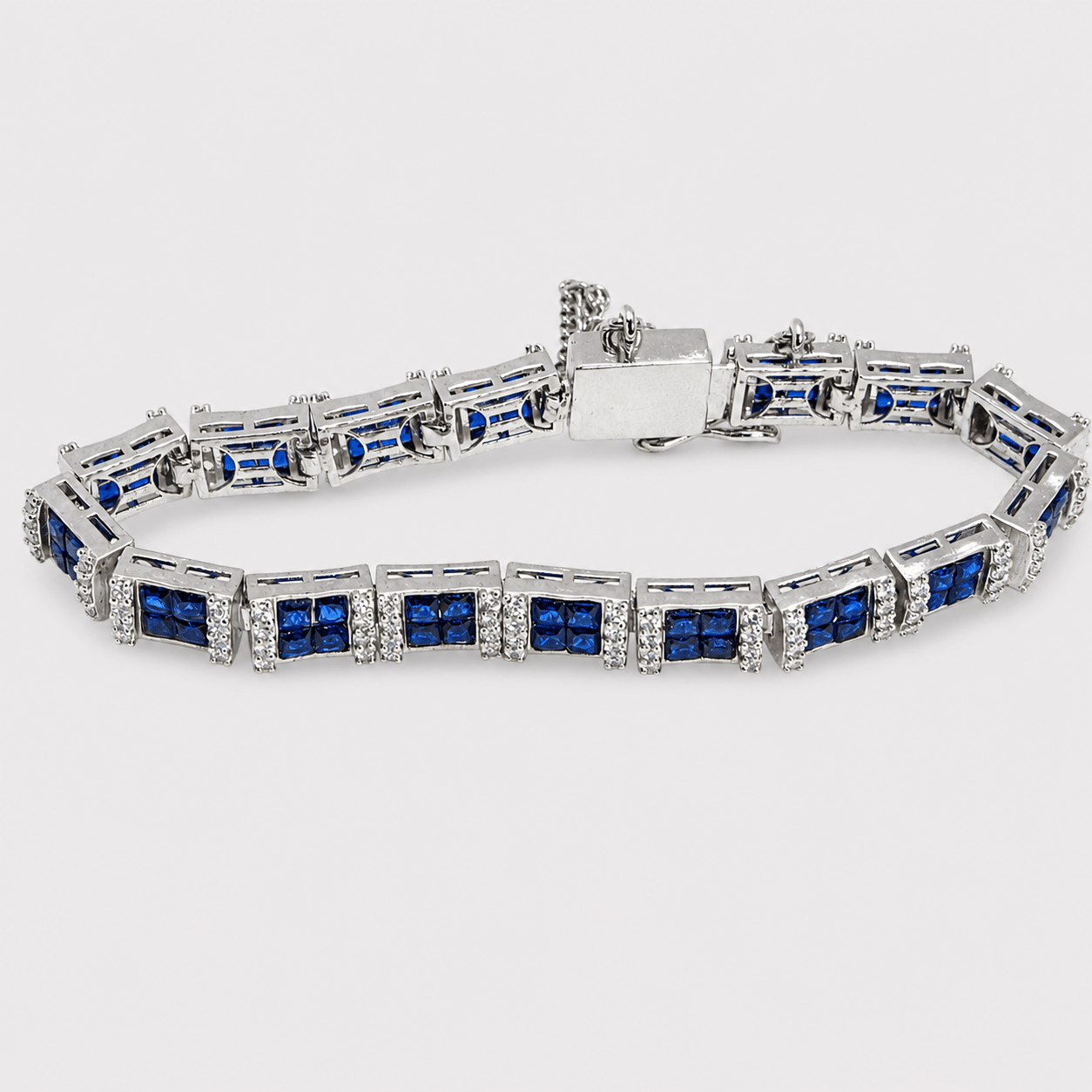 Blue Sapphire Tennis Bracelet – Emerald-Cut Gems - Rhodium Silver - Monis Anas Jewellers